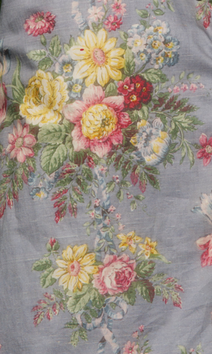 Close up of the floral print on the vest.