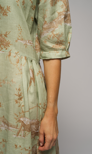 Closeup of a lady's arm showing a capped 3/4 sleeve.